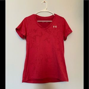 A pink under armor workout tee